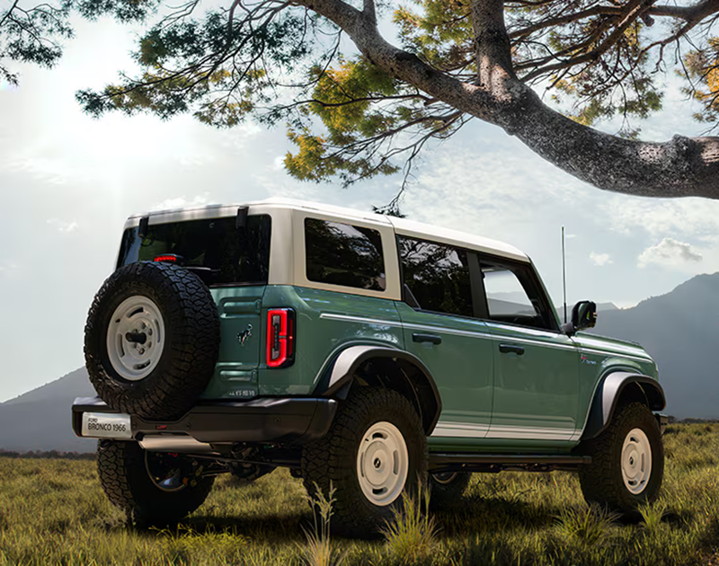 First debuting in 1966, the Ford Bronco boasted a vintage and rugged exterior, featuring frameless doors and a rear-mounted spare tire.